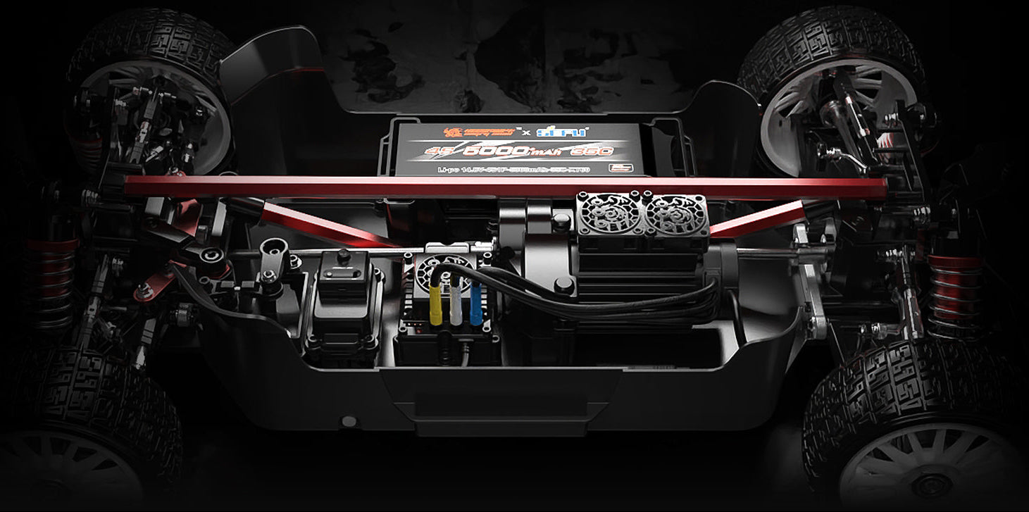 Close-up of vehicle chassis with visible components on a dark background