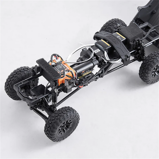 FMS FCX24m 1:24 Toyota Tacoma RTR RC crawler in grey, front three-quarter studio shot