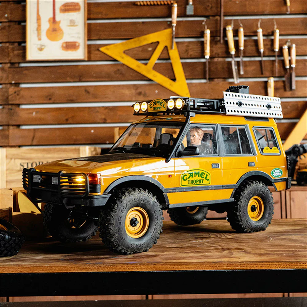 FMS FCX10 Land Rover Discovery RC Crawler - lifestyle shot on a workbench